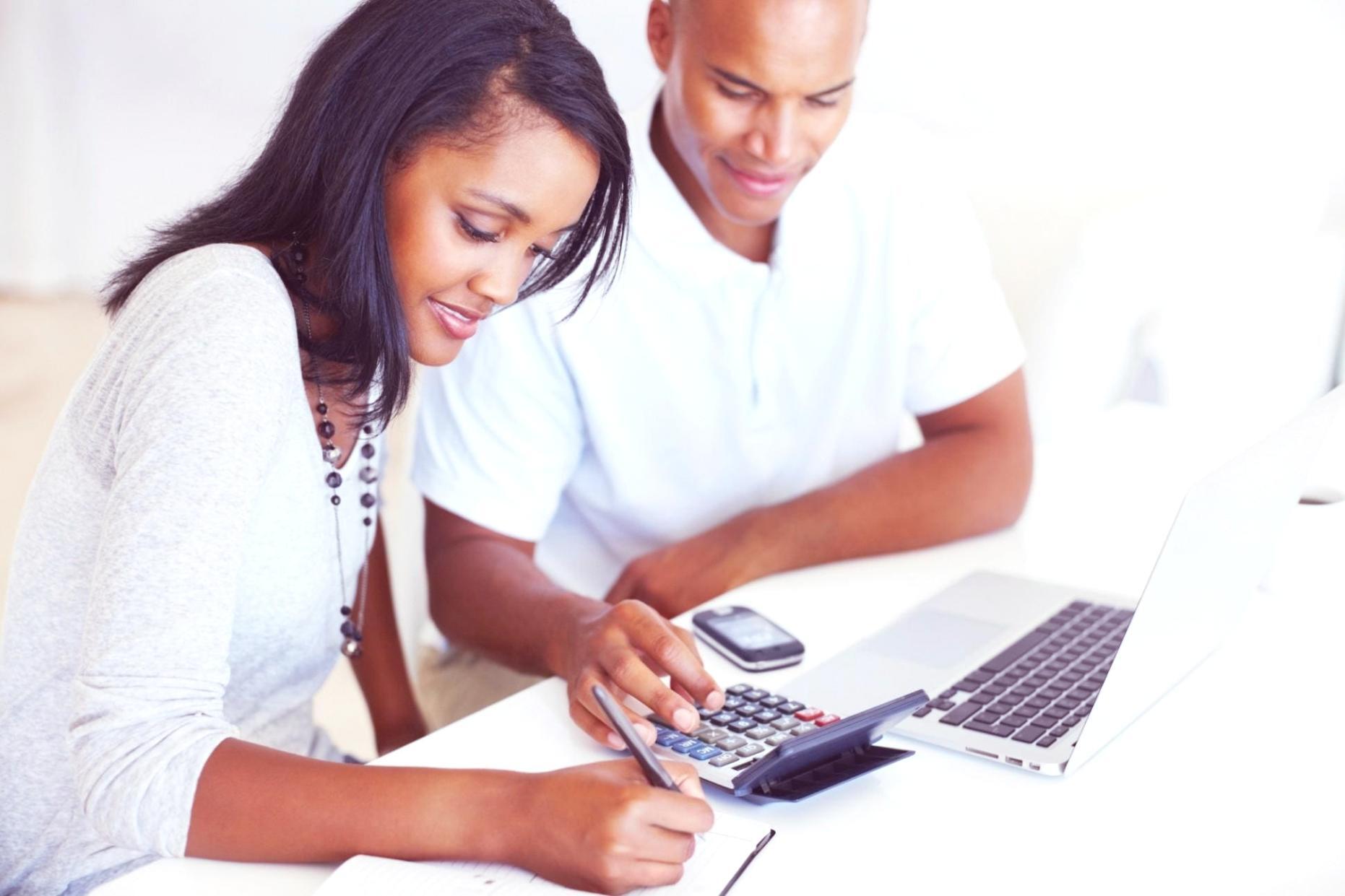 Close-up of editing bay equipment showing professional monitors and color calibration tools